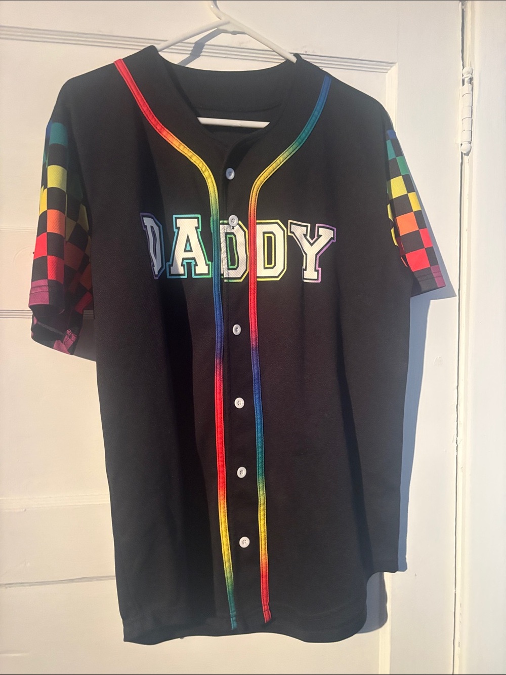 Spencer's Black Baseball Jersey with Rainbow Trim and Checkerboard Sleeves